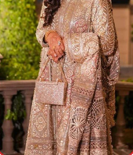 Rose-gold hand-embellished formal outfit with a matching clutch