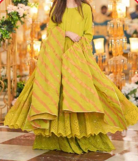 Lime green festive outfit with a striped dupatta and cut-work hem