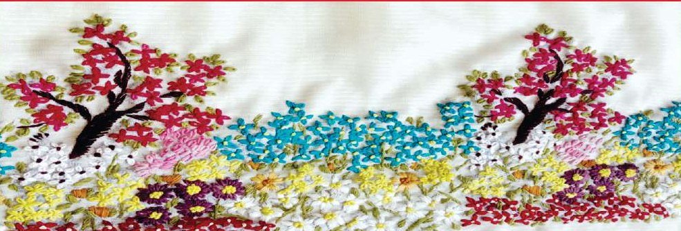 Colourful embroidered garden border with trees and flowers